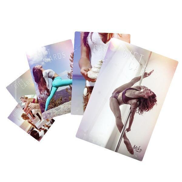 Mika Gift Cards - multiple past postcards laid out